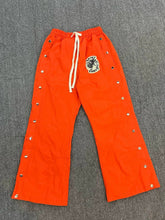 SAINT VANITY sporty casual straight-leg button-down pants